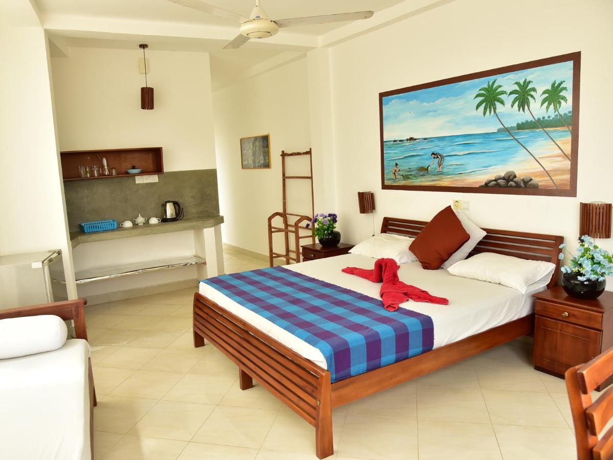 Hotel Happy Tuna Hikkaduwa Extérieur photo